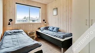 Schlafzimmer in Narhval Poolhus