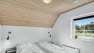 Schlafzimmer in Øhuse Poolhus