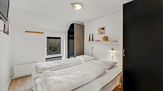 Schlafzimmer in Klegod Poolhus