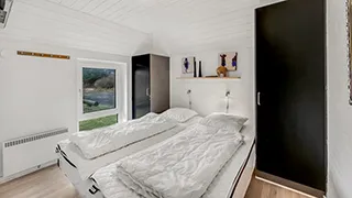 Schlafzimmer in Klegod Poolhus