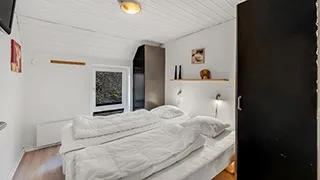 Schlafzimmer in Klegod Poolhus