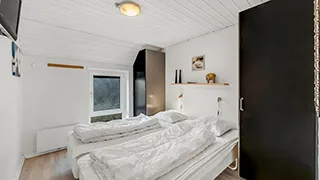 Schlafzimmer in Klegod Poolhus