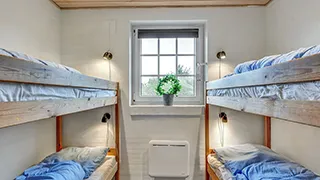 Schlafzimmer in Sandagers Poolhus