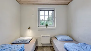 Schlafzimmer in Sandagers Poolhus