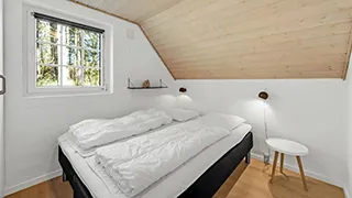 Schlafzimmer in Lyng Poolhus