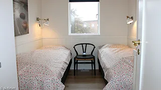 Schlafzimmer in Houvig Poolhus