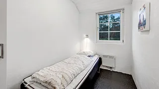 Schlafzimmer in Brunbjerg Poolhus