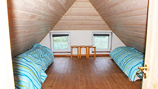 Schlafzimmer in Søndergaards Poolhus