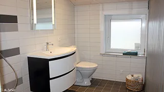 Badezimmer in Houvig Spahus
