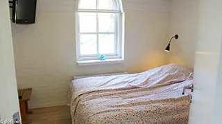 Schlafzimmer in Tyttebærhus