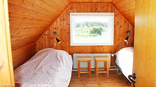 Schlafzimmer in Tyttebærhus