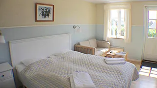 Schlafzimmer in Gyvel Appartement