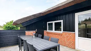 Terrasse von Tættest på Stranden Hus