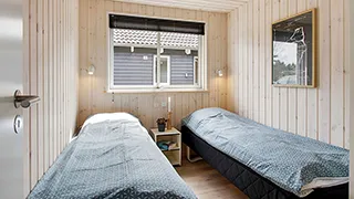 Schlafzimmer in Skovbrynet Poolhus