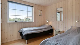 Schlafzimmer in Puldal Poolhus