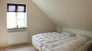 Schlafzimmer in Hus Fidde
