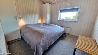 Schlafzimmer in Hus Klitten på Lakolk