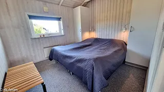 Schlafzimmer in Hus Klitten på Lakolk