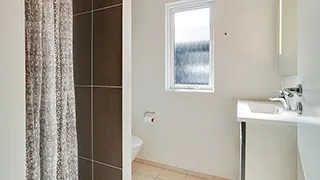 Badezimmer in Ålbæk Poolhus