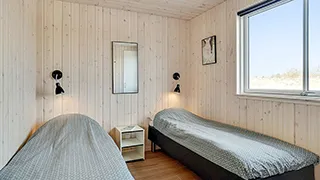 Schlafzimmer in Trane Poolhus