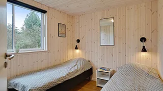 Schlafzimmer in Polderrev Poolhus