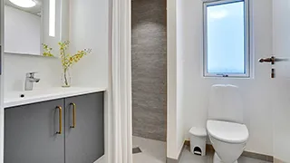 Badezimmer in Dyrehave Poolhus