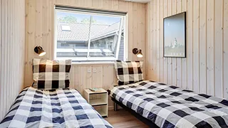 Schlafzimmer in Dalmose Poolhus