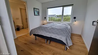 Schlafzimmer in Tjørne Wellnesshus