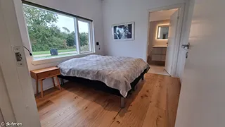 Schlafzimmer in Tjørne Wellnesshus