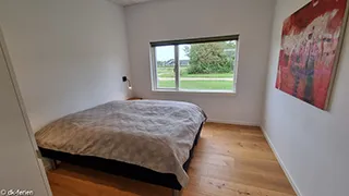 Schlafzimmer in Tjørne Wellnesshus