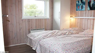 Schlafzimmer in Aarøsund Hyggehus