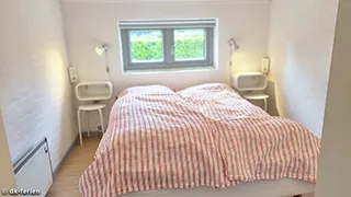 Schlafzimmer in Feriehus Lærkemose