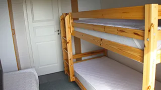 Schlafzimmer in Udsigtshus Skarrev