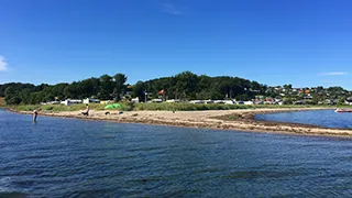 Strand in der Nähe von Udsigtshus Skarrev