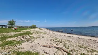 Strand in der Nähe von Skarrev Strandhus