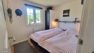 Schlafzimmer in Helles Feriehus