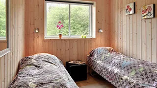 Schlafzimmer in Hus Kronens Have
