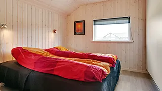 Schlafzimmer in Skiften Poolhus