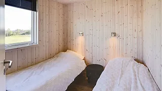 Schlafzimmer in Strandbakken Poolhus