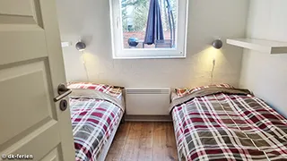 Schlafzimmer in Trollius Poolhus