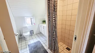 Badezimmer in Trollius Poolhus