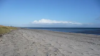 Strand in der Nähe von Hejmdals Poolhus