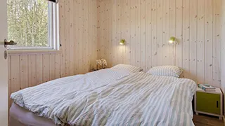 Schlafzimmer in Olsens Poolhus