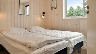 Schlafzimmer in Linde Poolhus