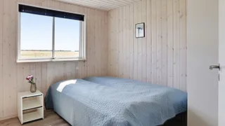 Schlafzimmer in Hjorte Poolhus