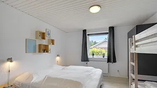 Schlafzimmer in Ahorn Poolhus