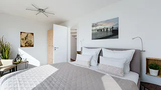 Schlafzimmer in Haus mit Strandkorb Idyll